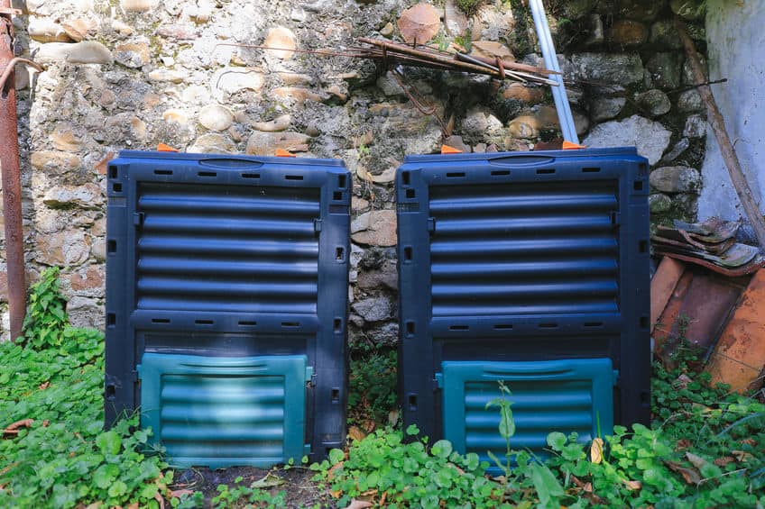 two compost bins in sunlight with some shade
